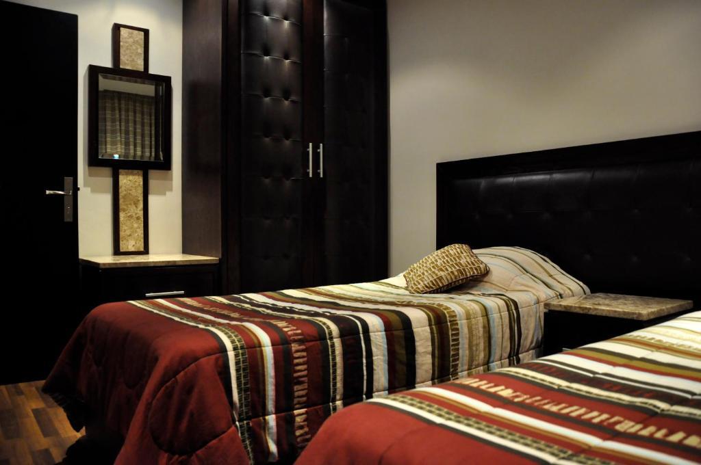 Granada Suites Hotel Amman Kamer foto
